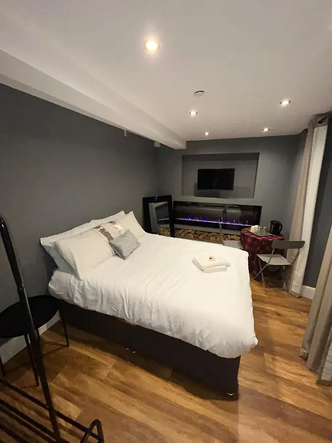Cosy Double Bed With Fire Place location